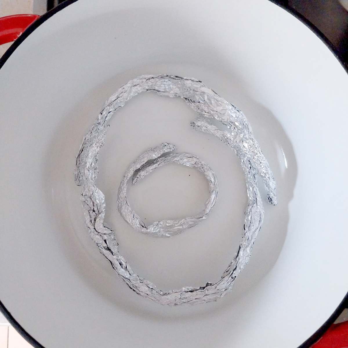 Aluminium circles in a Dutch oven.