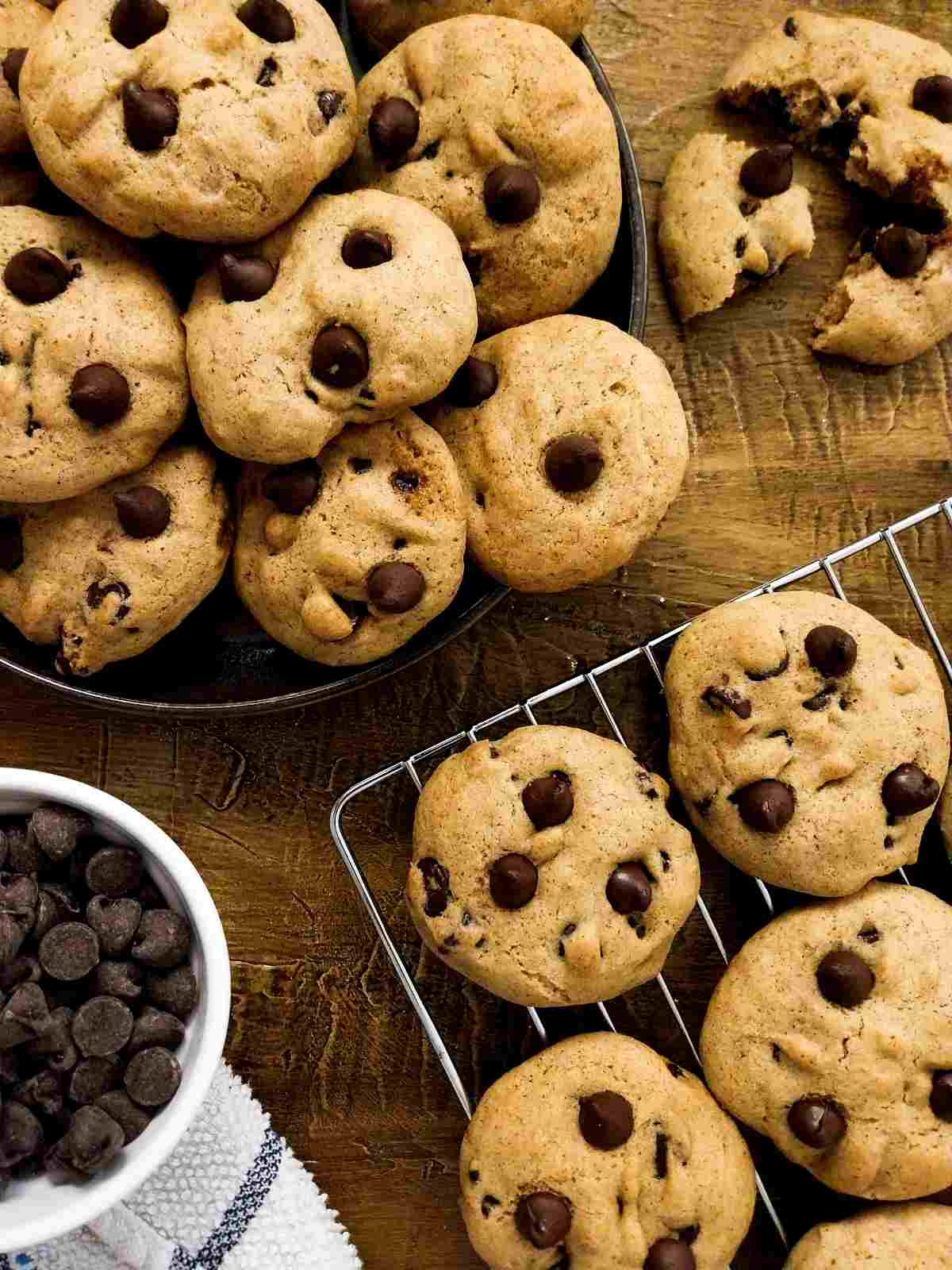 Gluten free sourdough starter cookies on a cooling rack and on a plate.