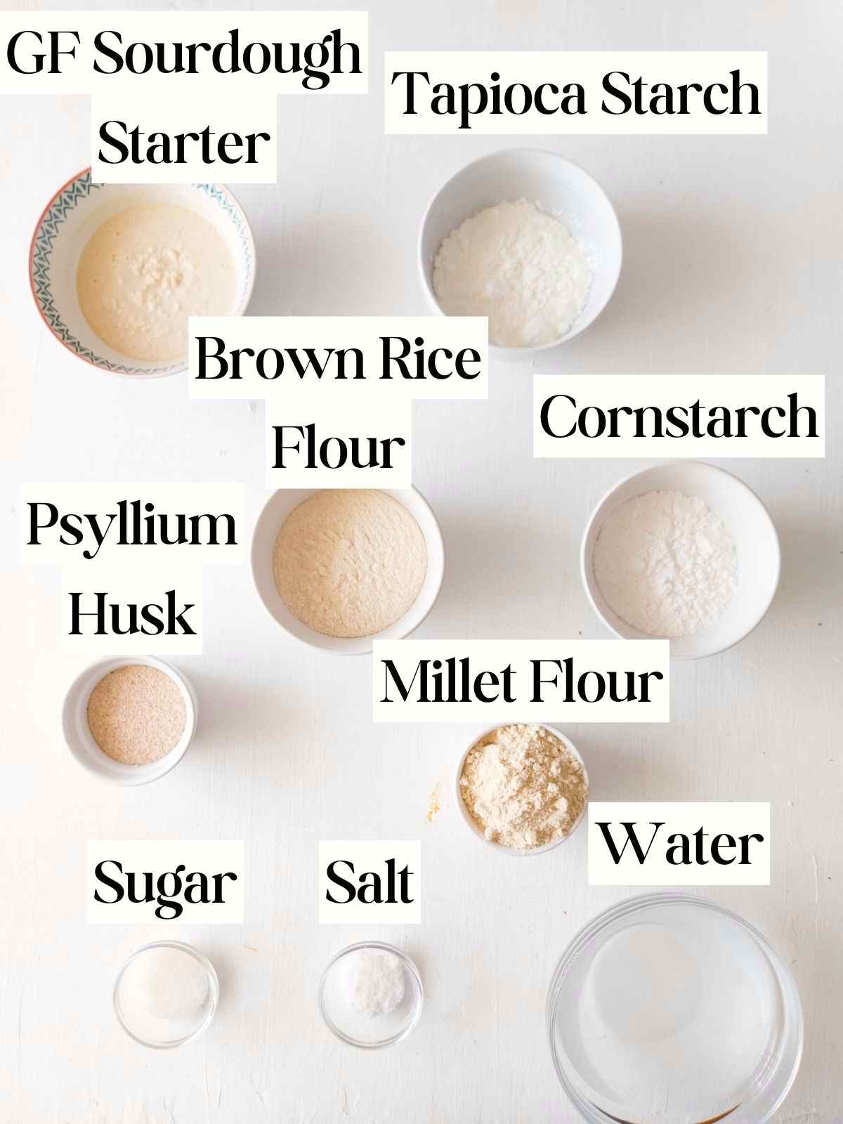 Ingredients for gluten-free sourdough bread in little bowls.