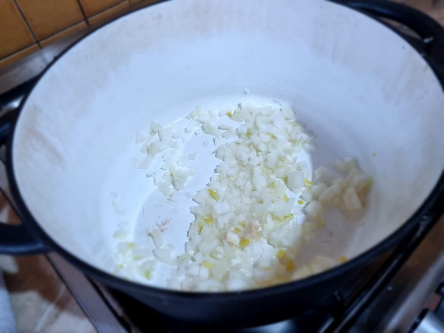 Chopped onions and garlic in a dutch oven.