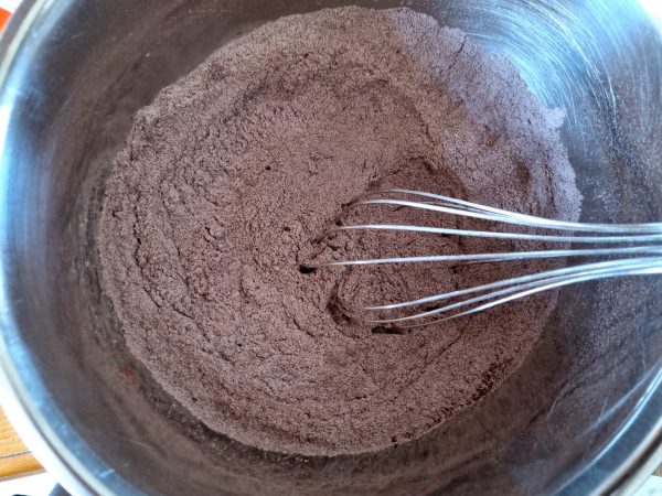 Mixing the dry ingredients for the gluten free brownie cake