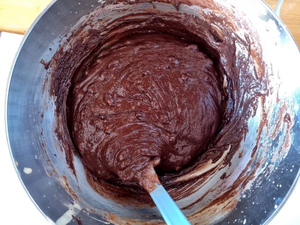 Mixing the dry and wet ingredients for the gluten free brownie cake