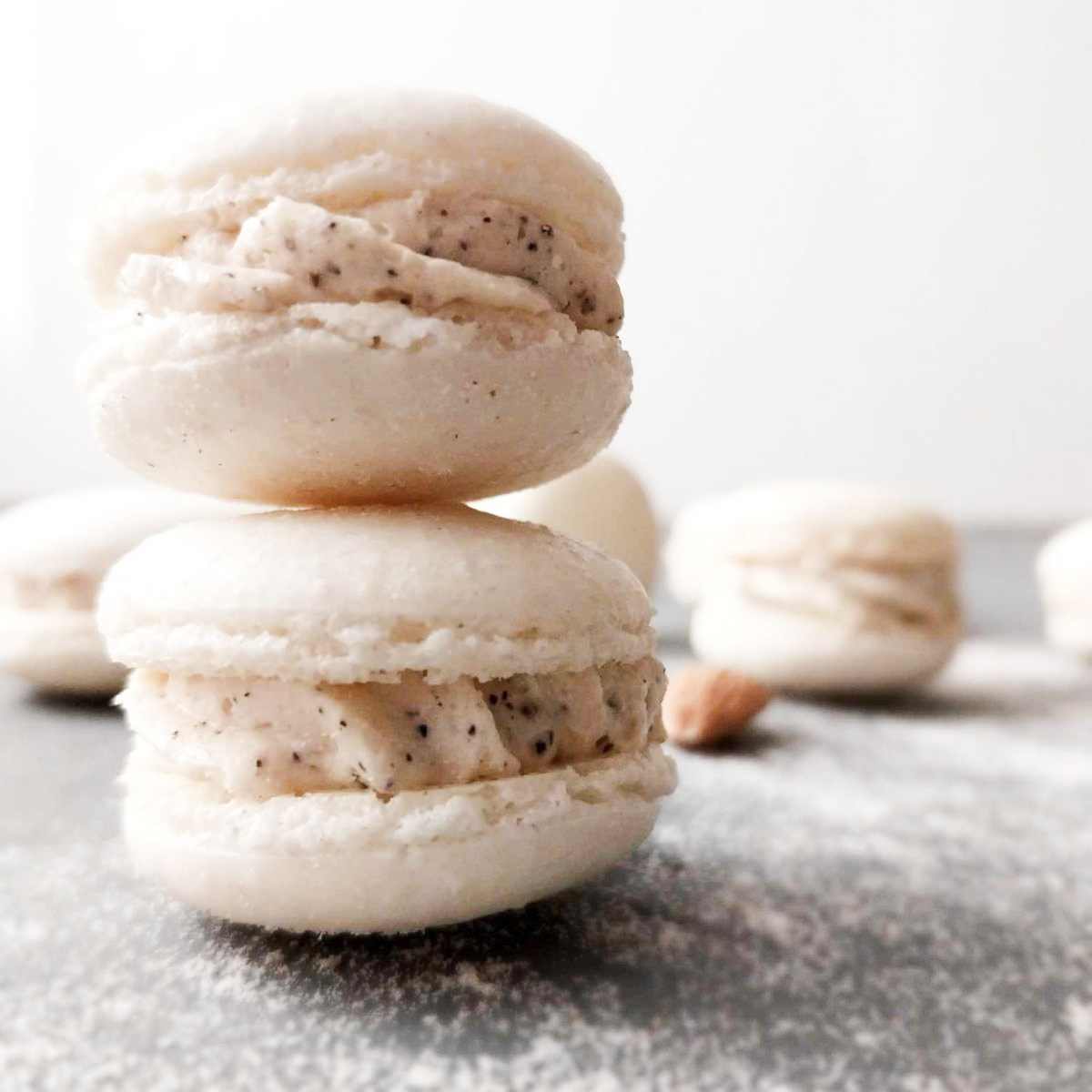 Coconut flour macarons stacked on top of each other with buttercream filling.