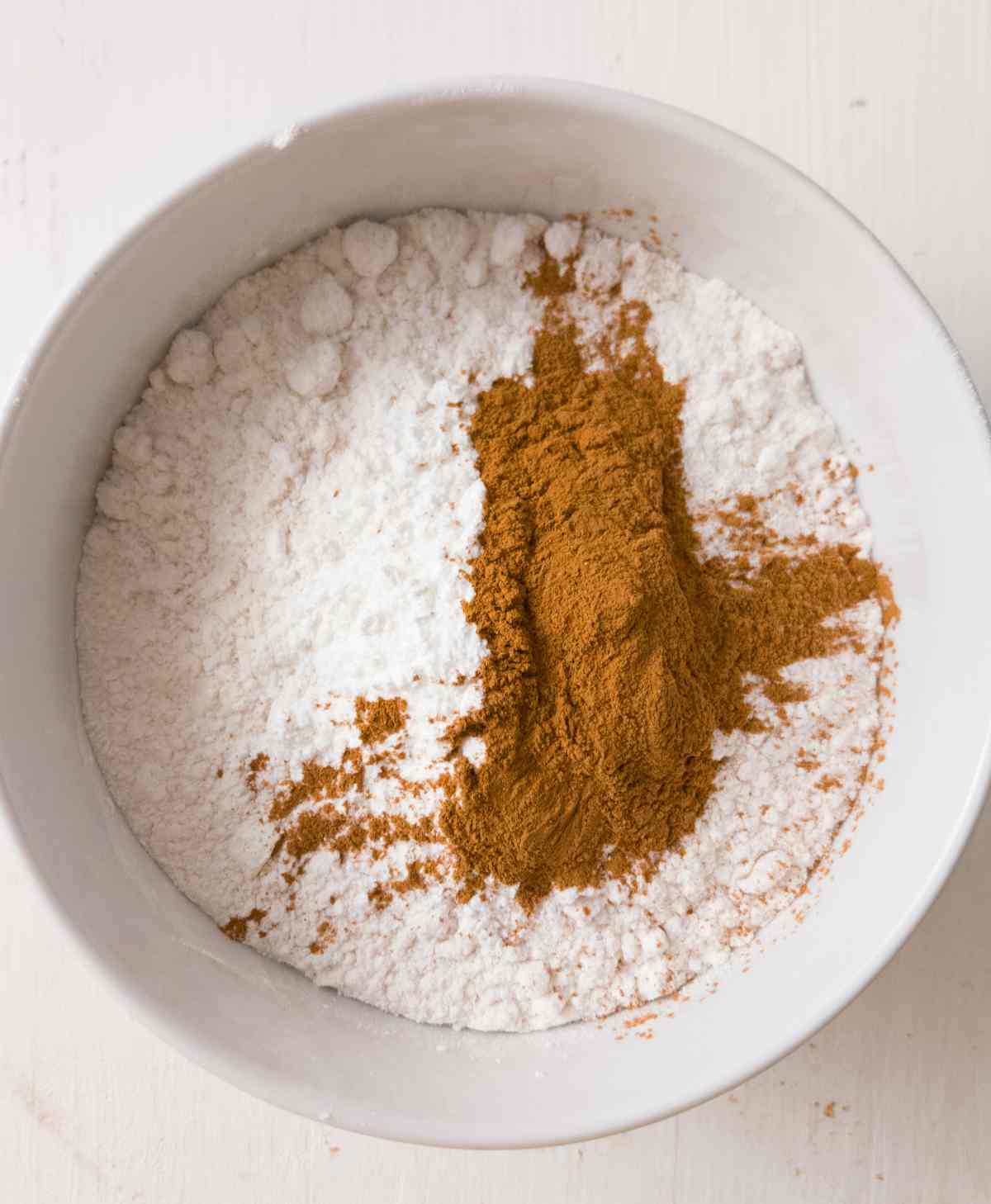 Dry ingredients in a bowl before mixing.