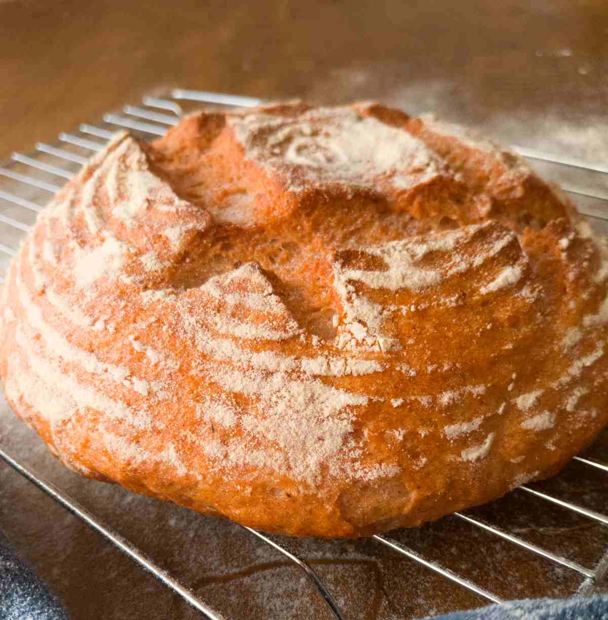 Gluten-Free bread with psyllium husk on a cooling rack up close.