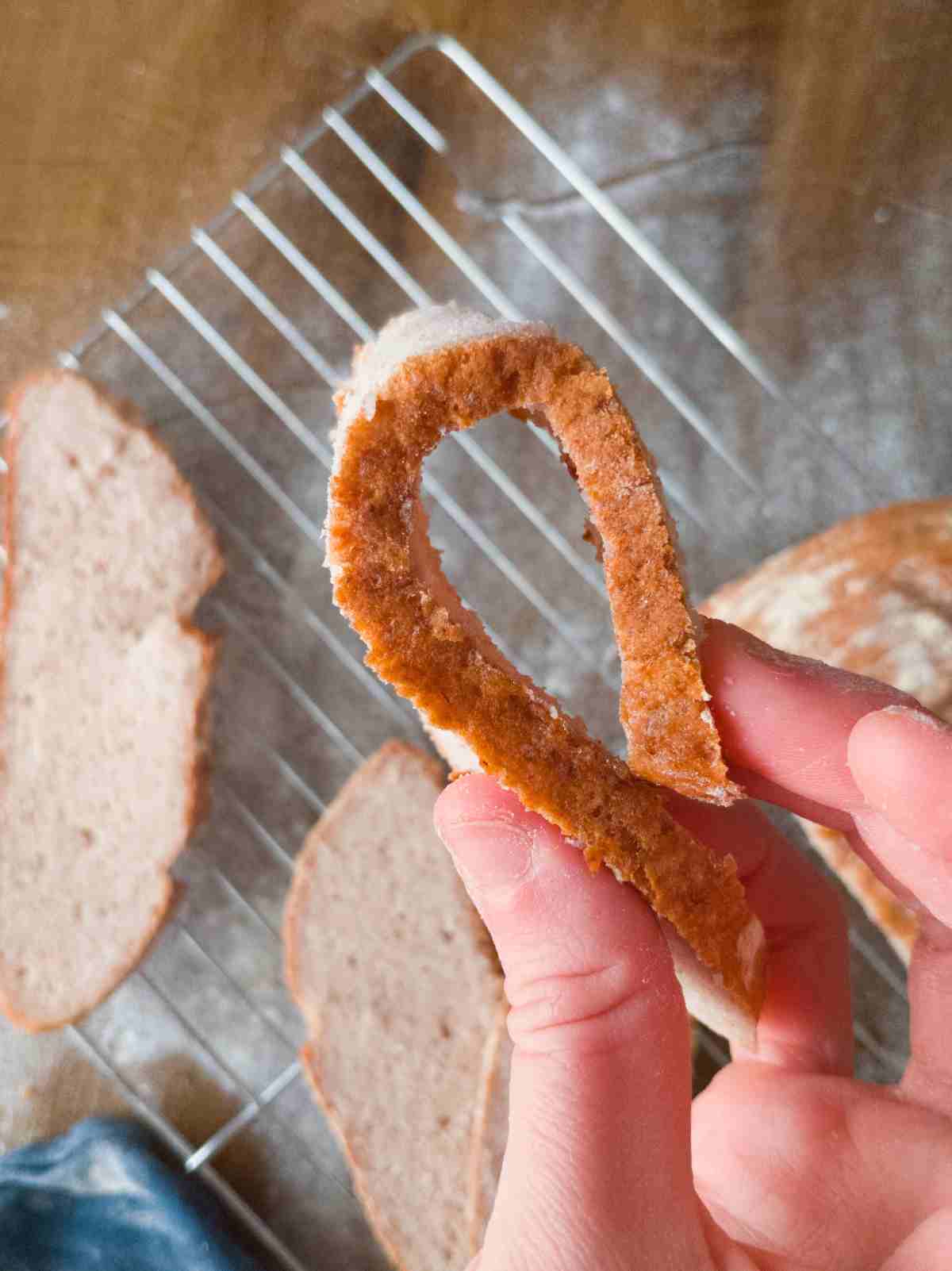 Gluten-free bread slice bent.