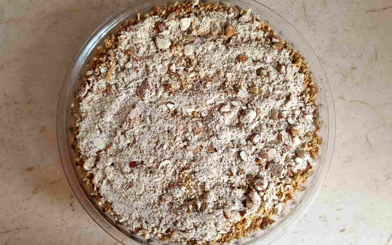 assembling the gluten free cherry crumble - almonds