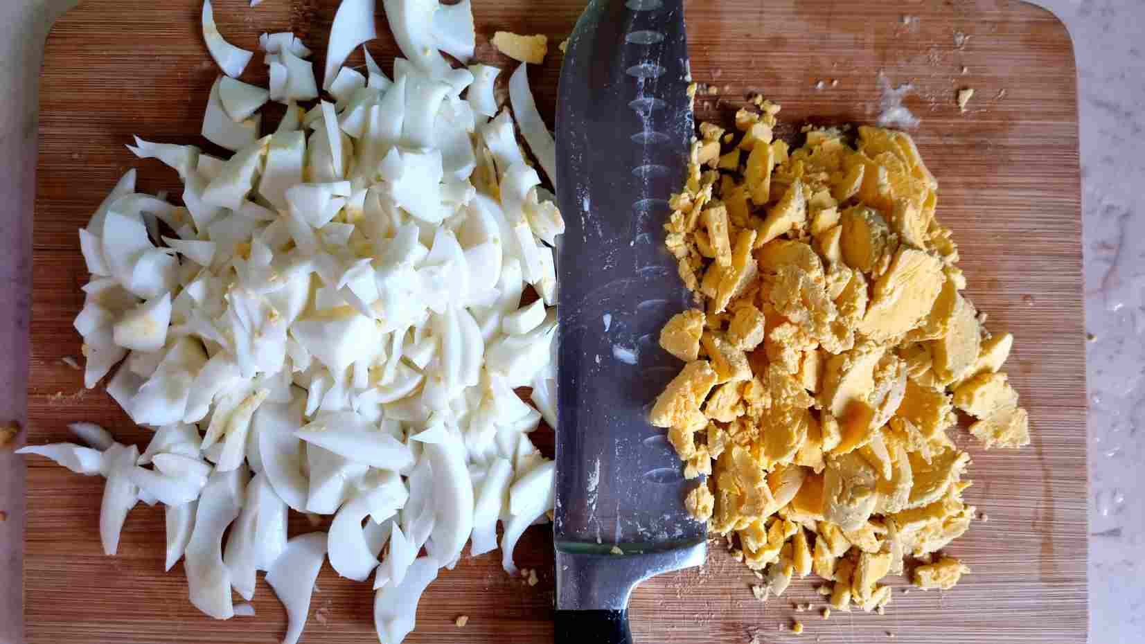 Chop the eggs for Hungarian Potato Casserole