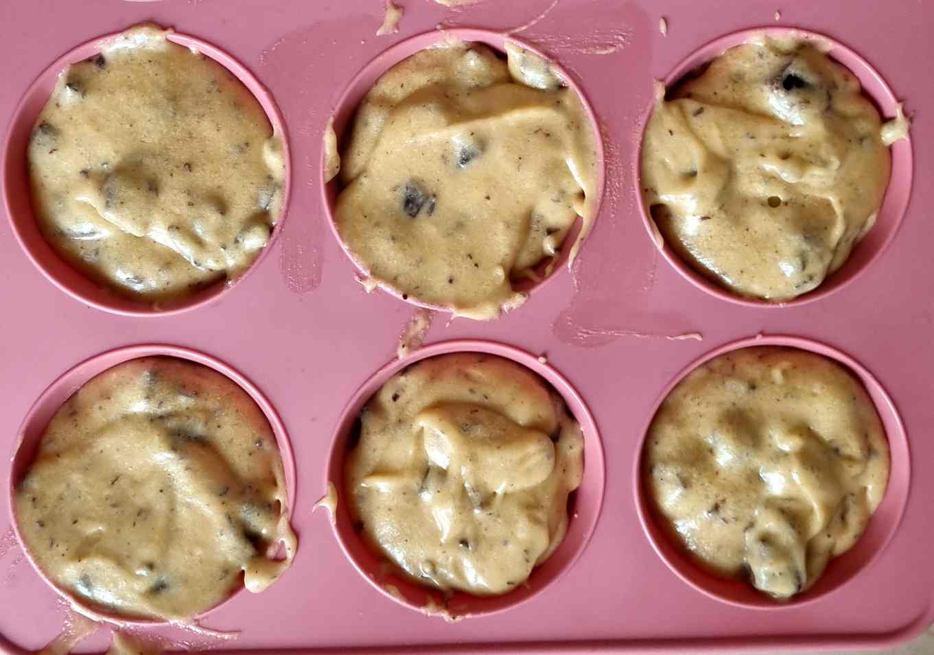 Fill the muffin tin with gluten free muffin batter