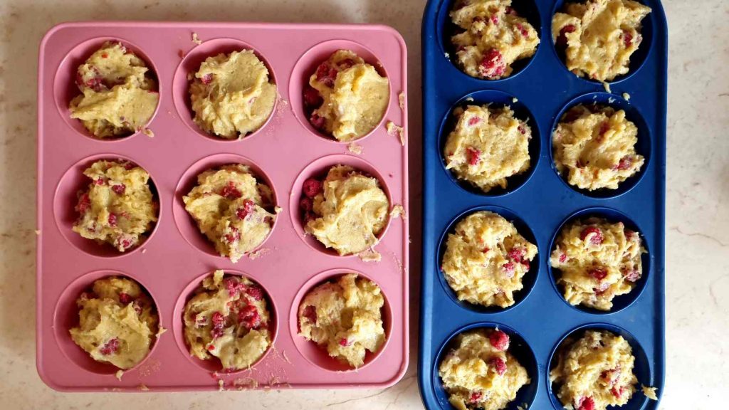Scoop the muffins into the muffin tins