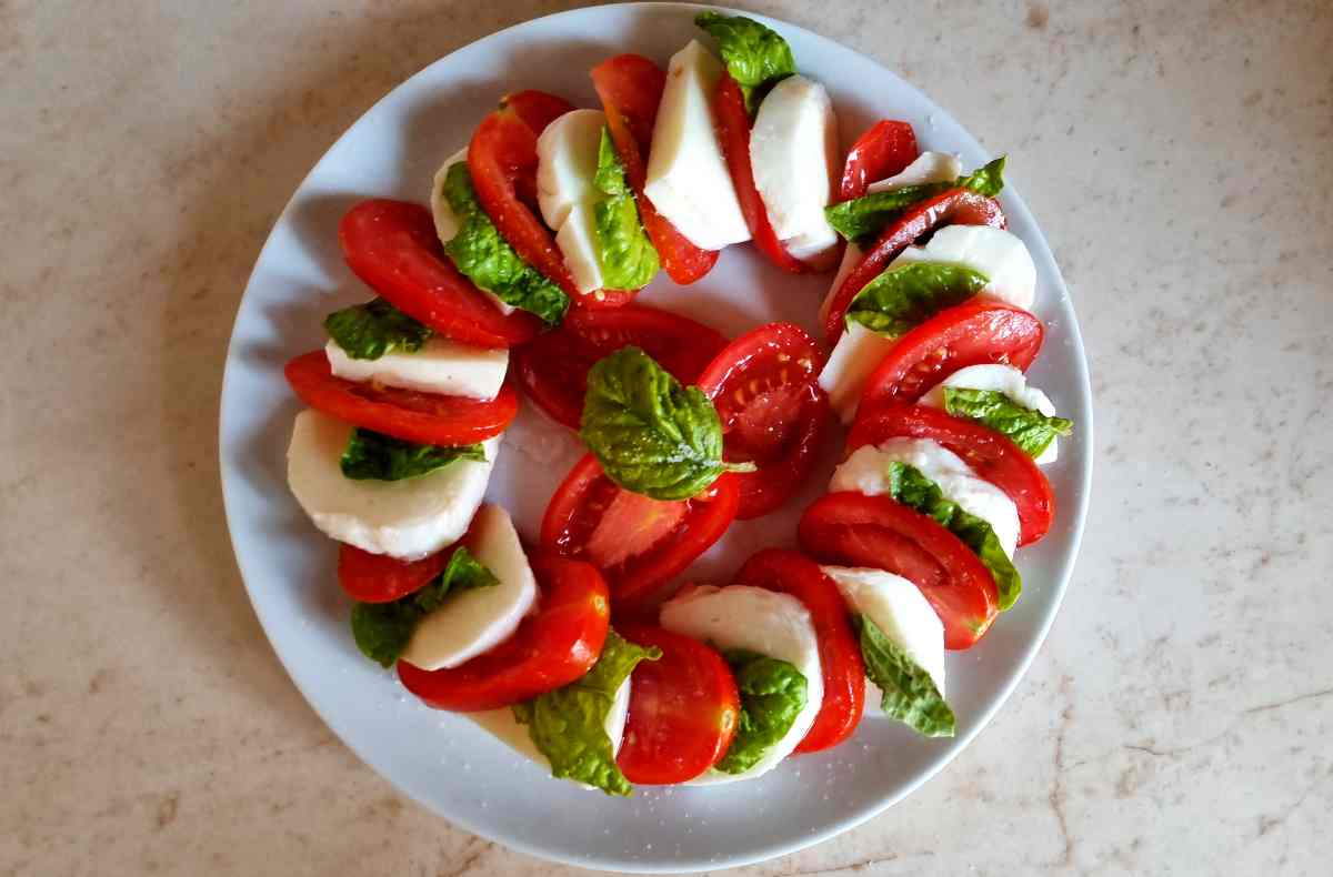 Caprese Salad with Cherry Tomatoes on a plate 