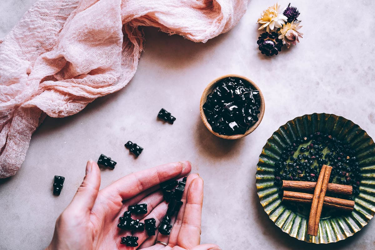 elderberry gummies in hands