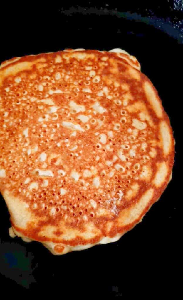 Flip the pancakes when golden brown.