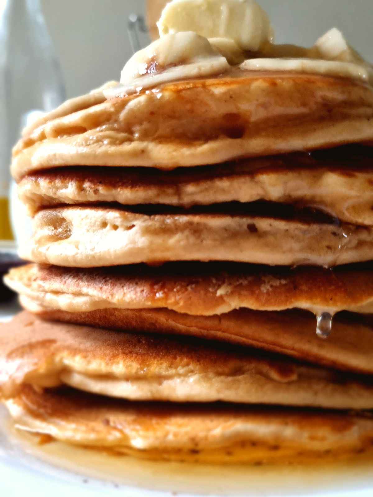 Gluten-free american pancakes stacked in a tall towel.