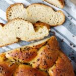 Gluten-free sourdough challah sliced up close.