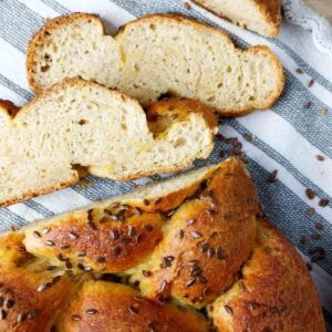 Gluten-free sourdough challah sliced up close.