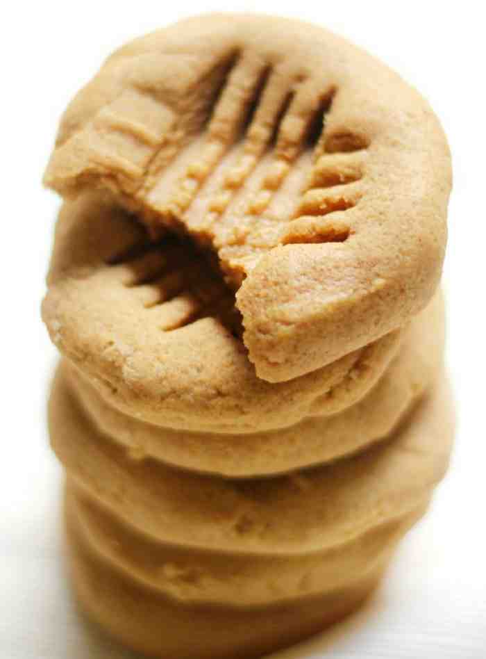 Peanut butter cookies stacked.
