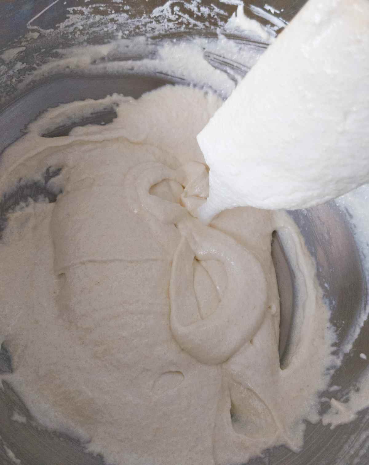 Figure 8 drawn in the batter with a silicone spatula over it.