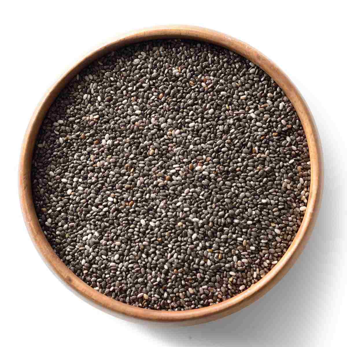 Chia seeds in a wooden bowl.