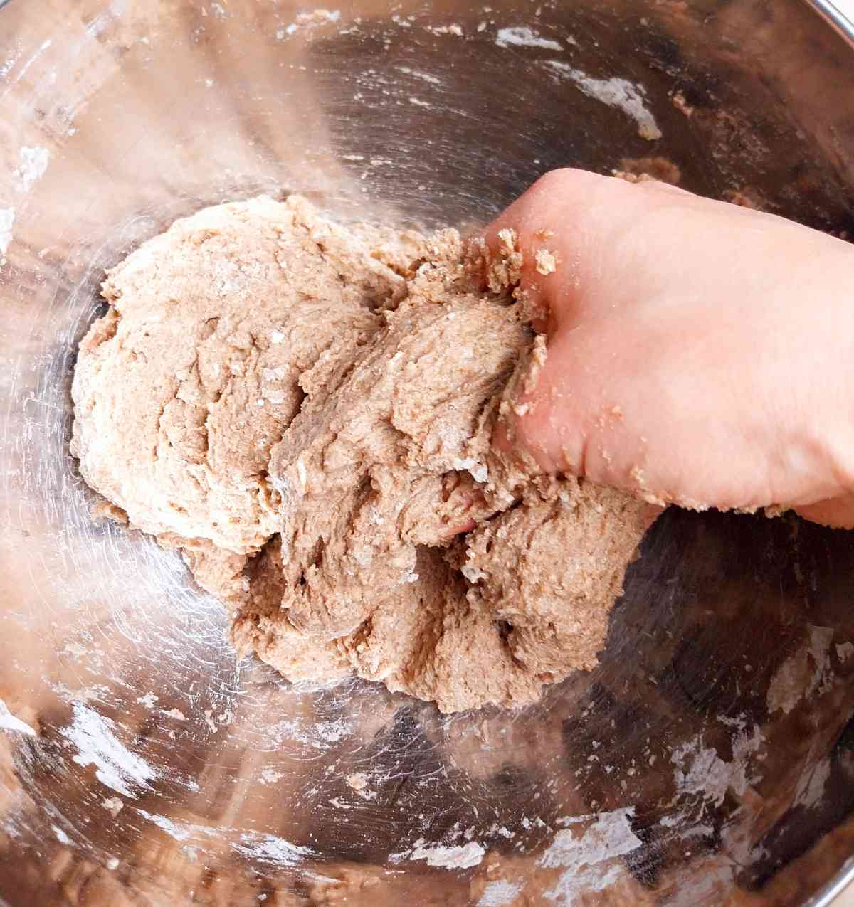 Mixing the dough by hand.