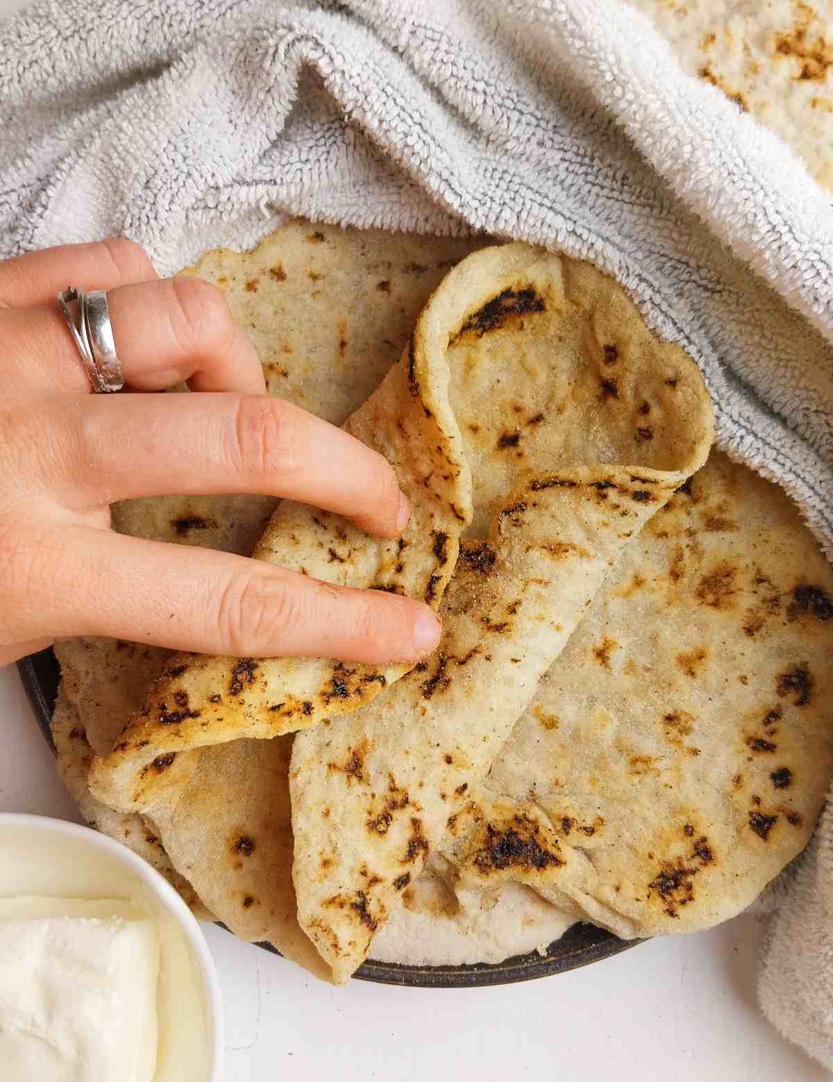 A lavash bread folded on top of other lavash breads.