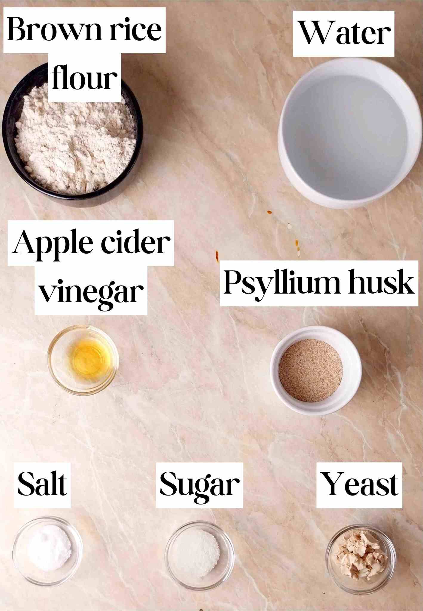 Ingredients in small bowls on a kitchen counter.