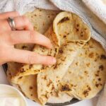 Lavash bread folded on top of other breads.