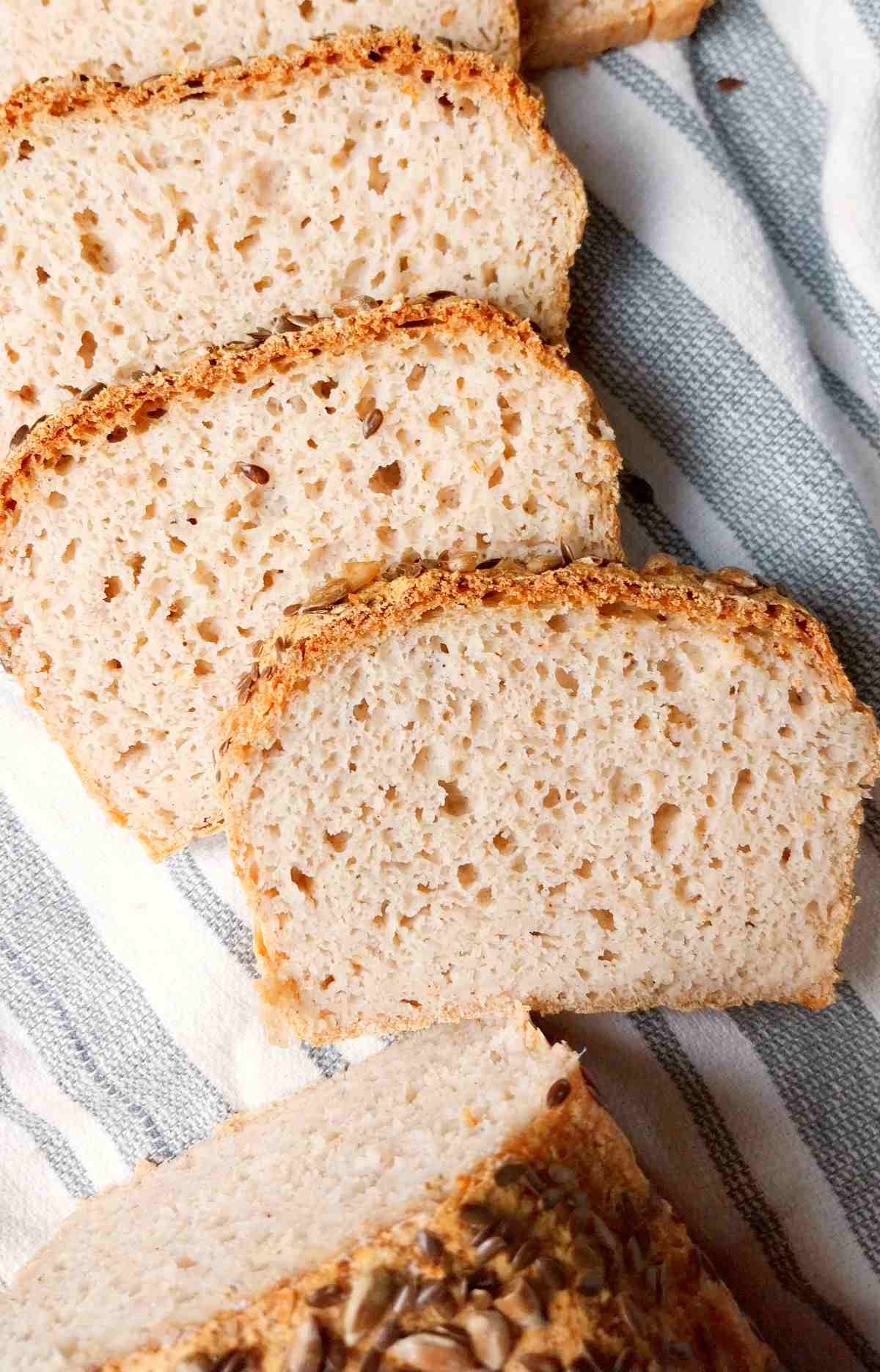 Slices of sorghum bread on a kitchen towel.