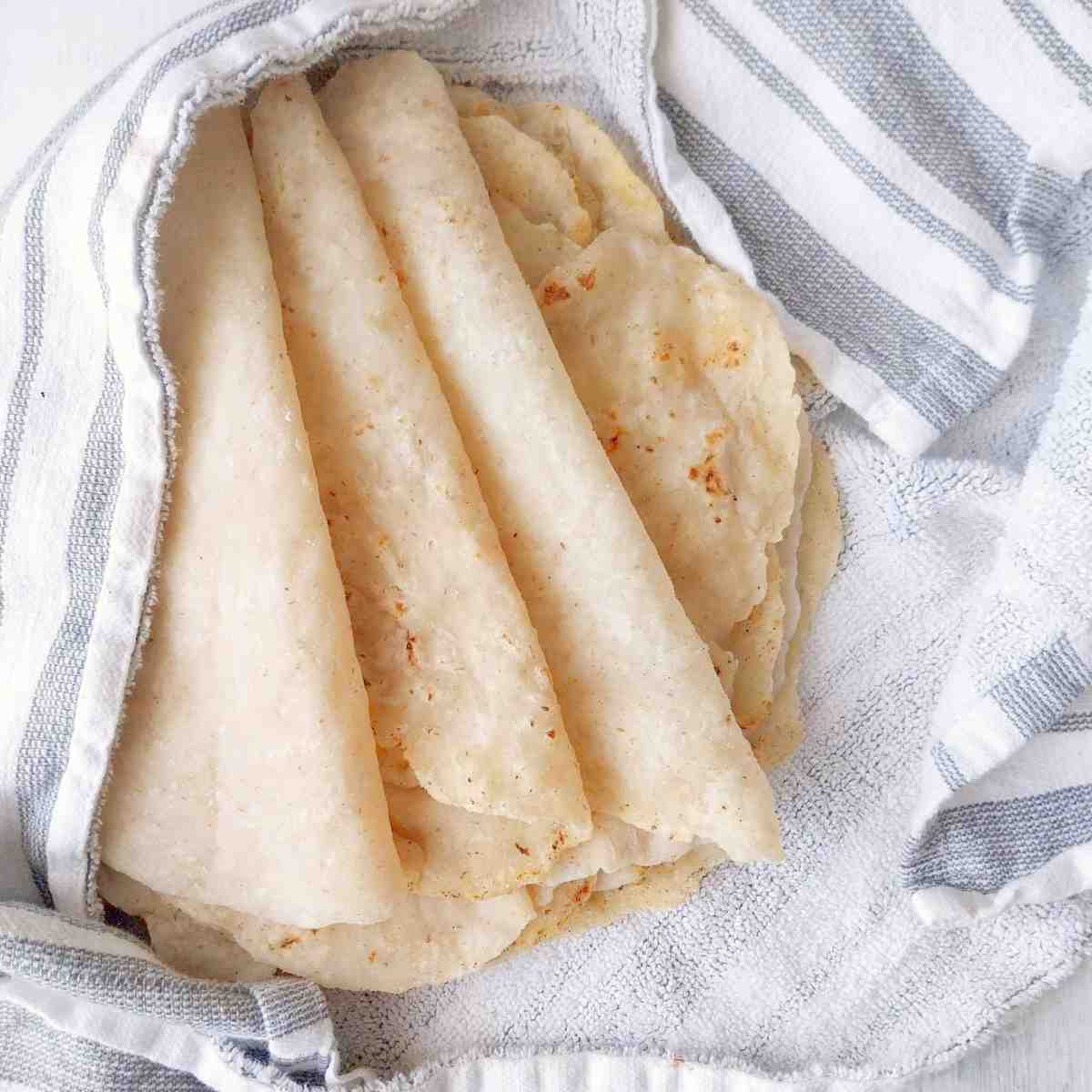 Gluten-free lavash bread on a kitchen towel.
