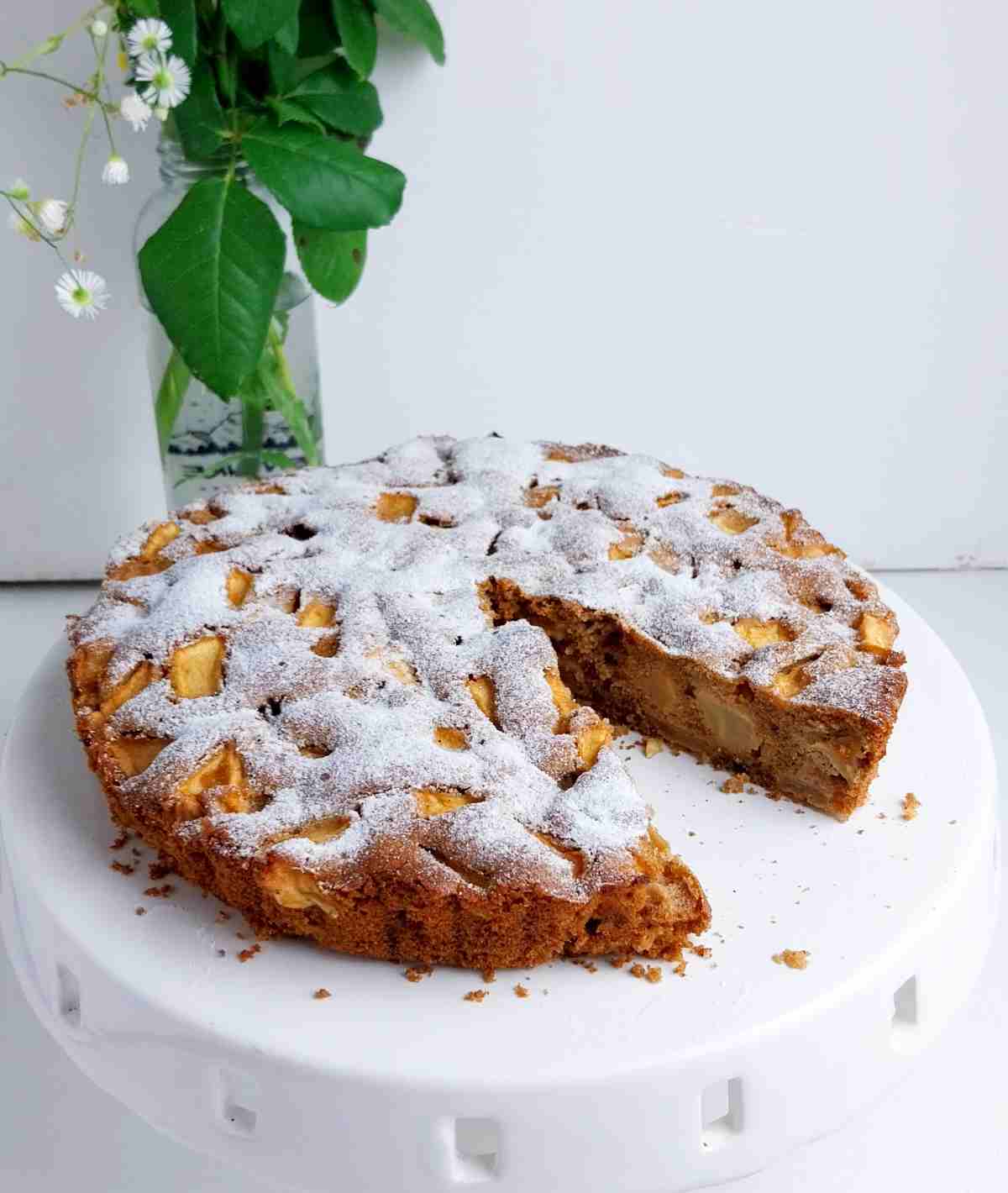 The buckwheat apple cake on the cake stand,