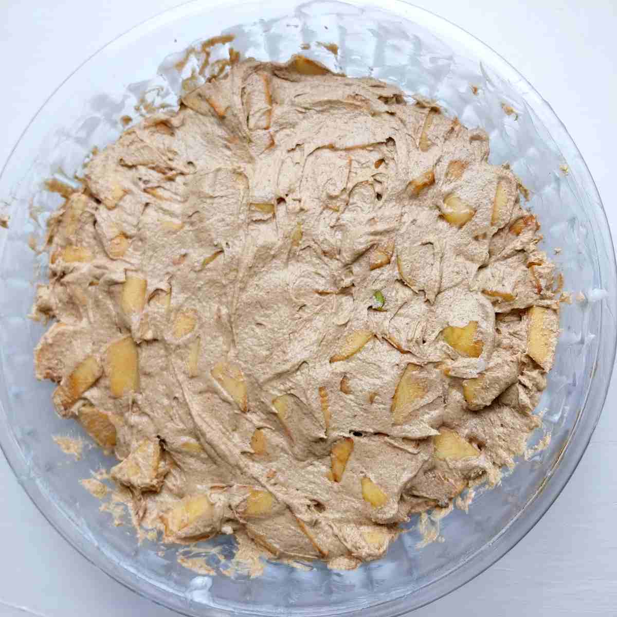 Cake batter in the greased dish.