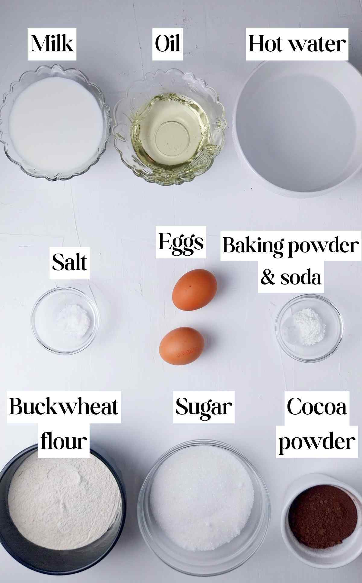 Ingredients for the buckwheat cake on a white background.