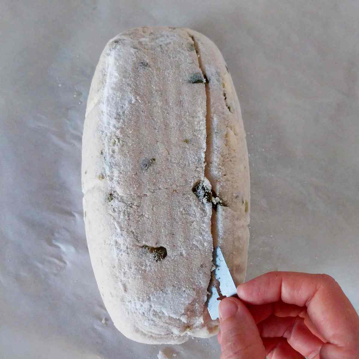 Scoring the dough.