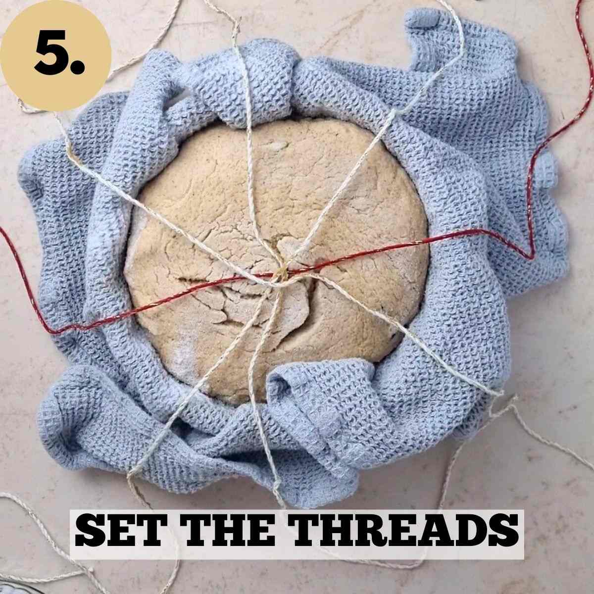 The dough with 4 threads on top.