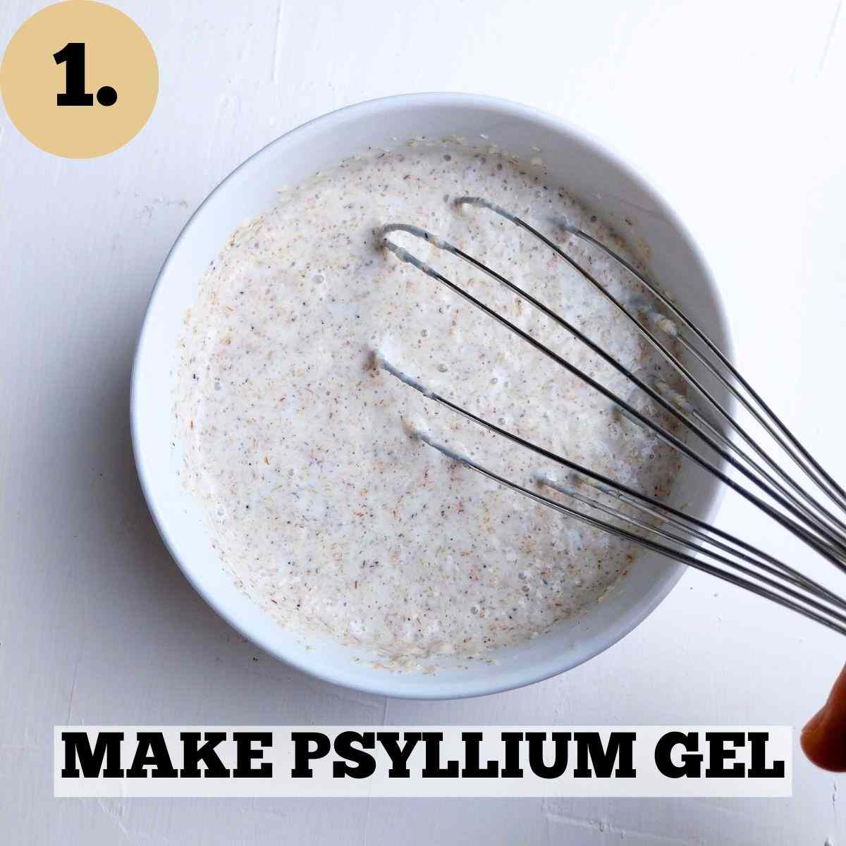 Buttermilk with psyllium husk in a white bowl and a whisk.