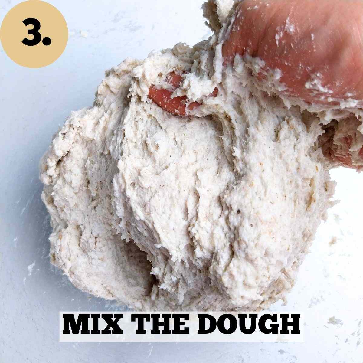 Mixed sticky dough on a white surface.