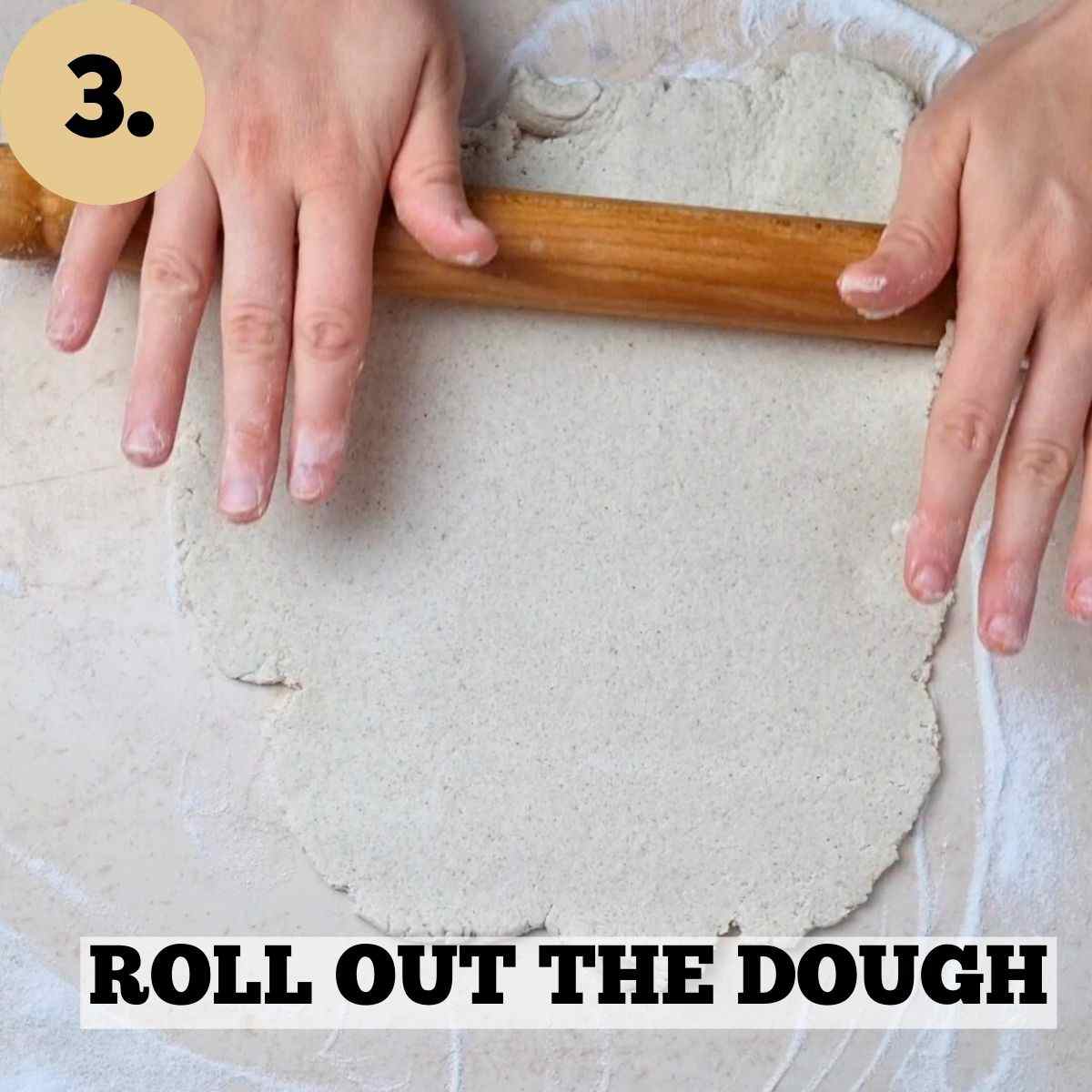 Rolling out the dough with a wooden rolling pin on a floured light surface.