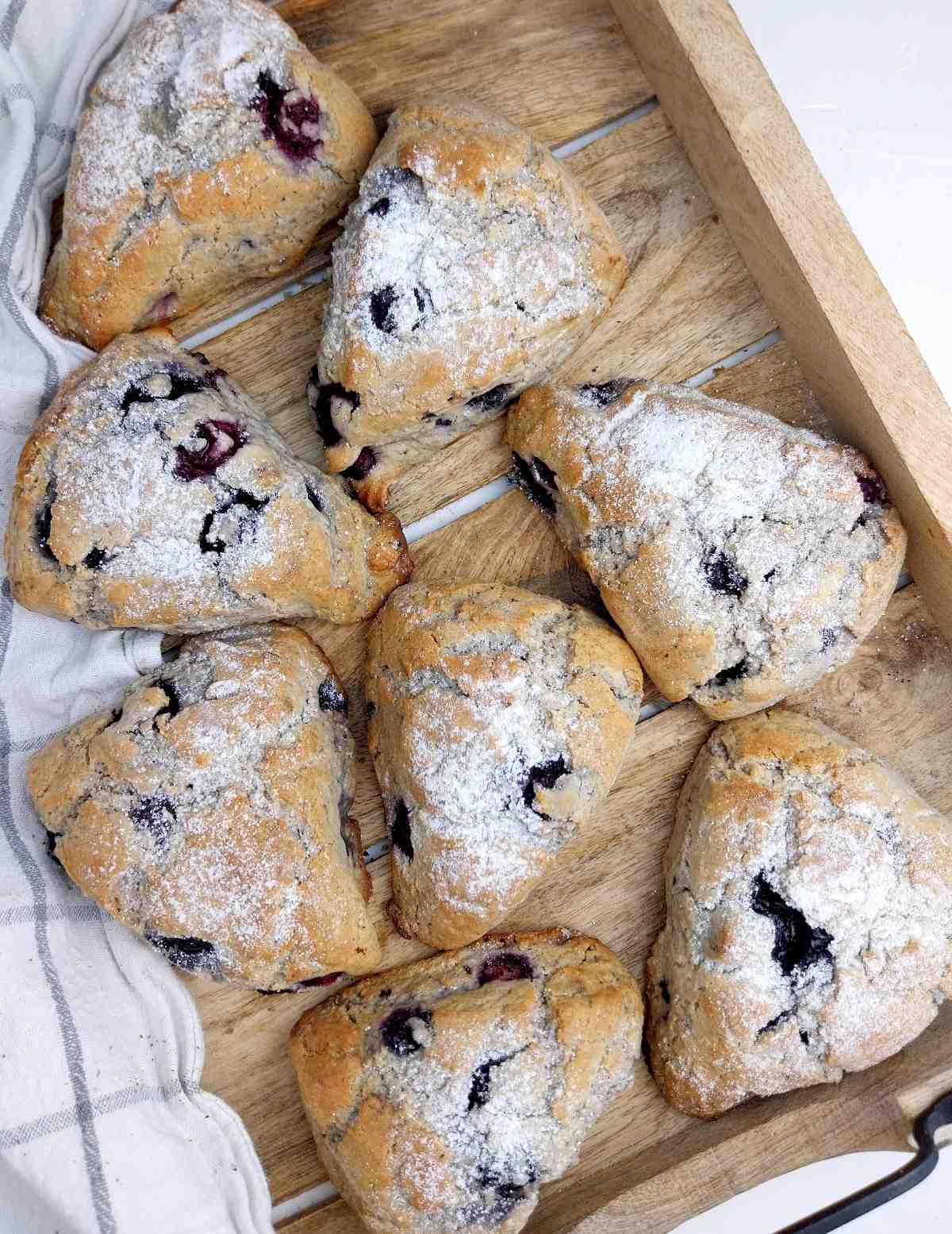 Scones on a wooden surface.