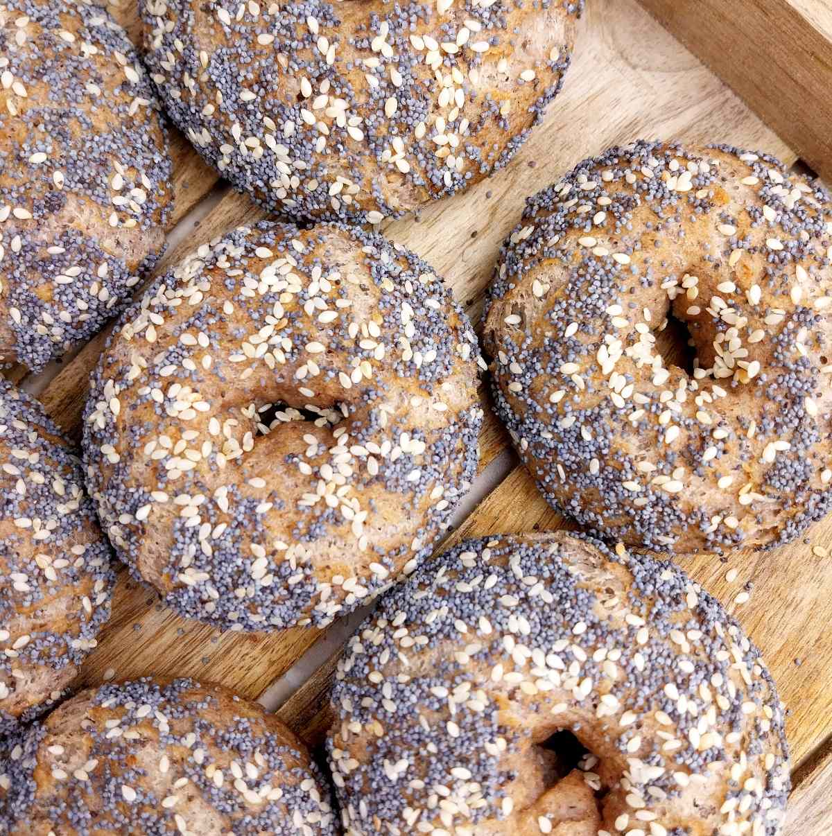 Bagels on a wooden surface.