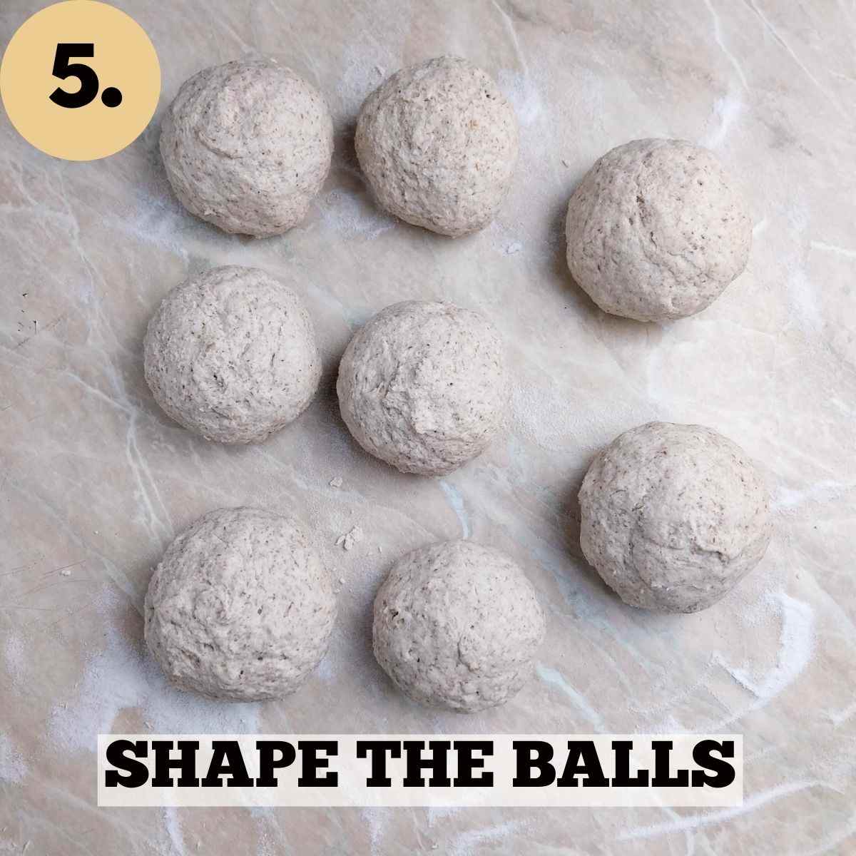 Shaped dough balls on a kitchen counter.