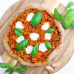 Pizza on a wooden board.