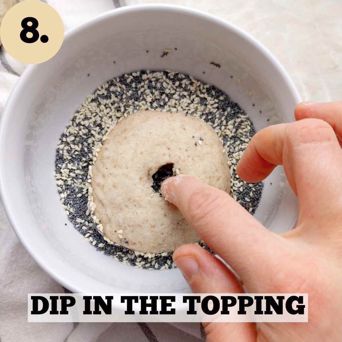 Dipping a bagel into seasoning.