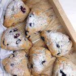 Buckwheat scones on a wooden surface.
