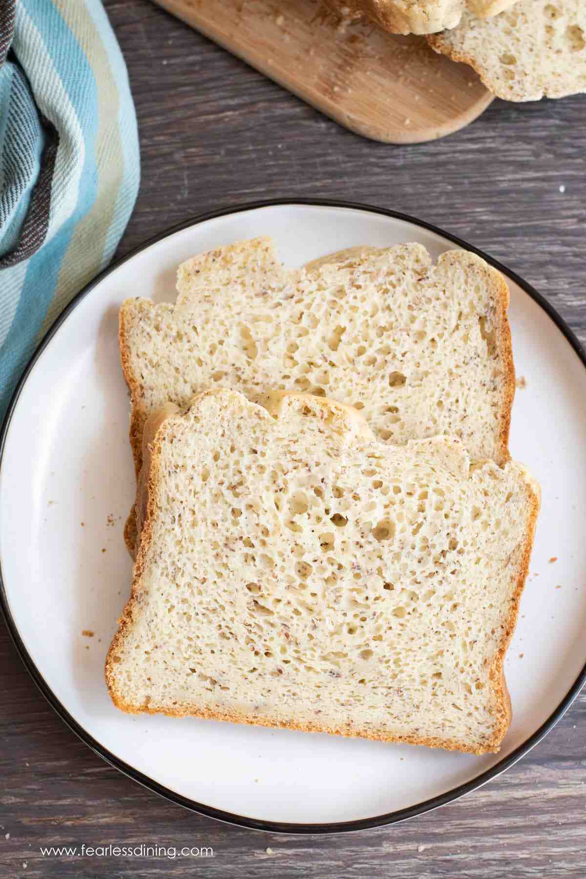 Slices of bread on a white plate.