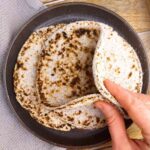 Bent roti on a plate.
