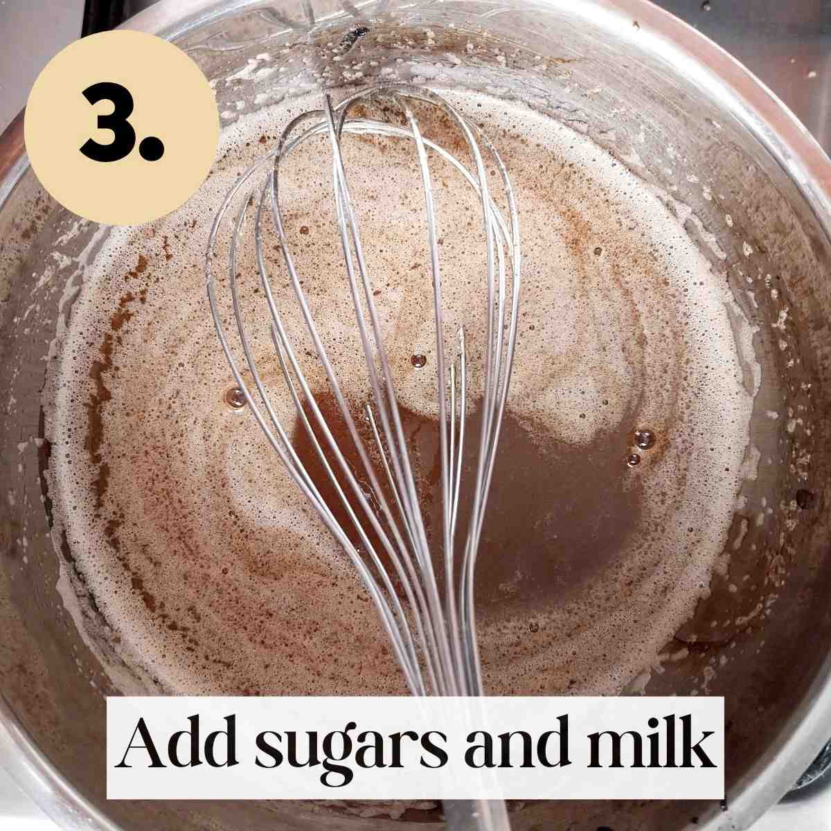 Wet ingredients all mixed with a whisk in the metal saucepan.